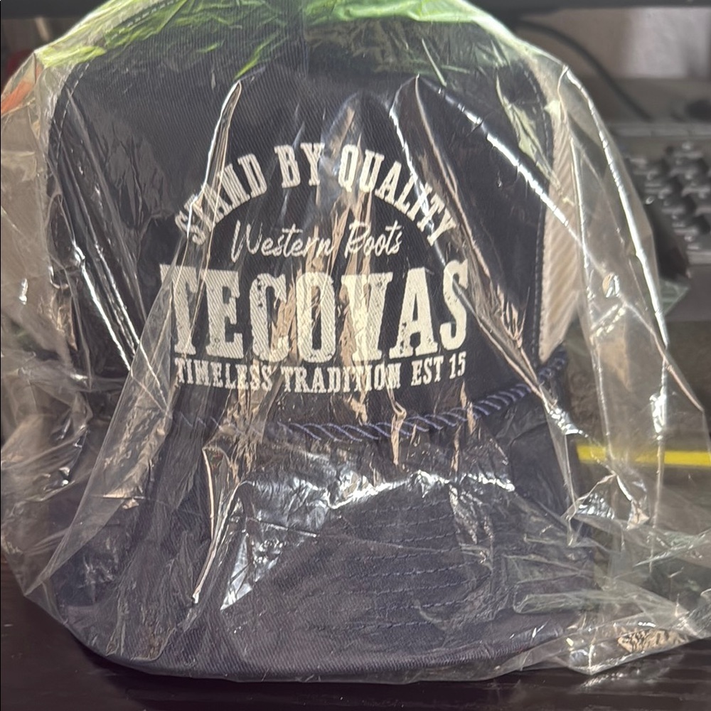 Brand new Tecovas Dark Blue trucker Hat with White Text